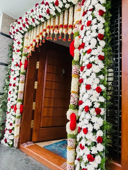 A duplicate of image 92, highlighting the beautiful craftsmanship of the floral door decoration.