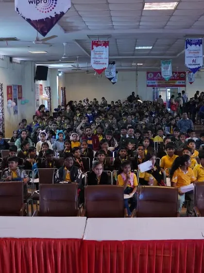 A packed auditorium for the Mathopedia competition. These events are a grand celebration of our students' talent and hard work.
