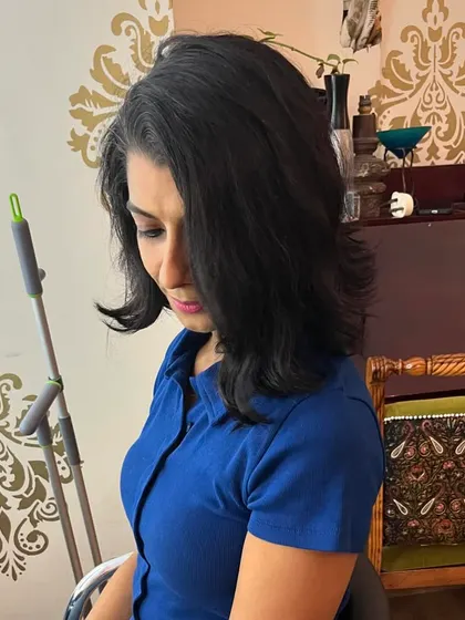 A softer, slightly longer bob style for Deepika.
