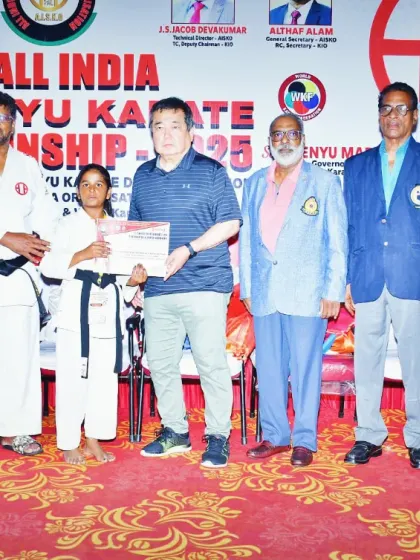 A proud moment as one of my students receives her certificate from the Governor of WSKF, Kenyu Mabuni, at the national championship. We focus on preparing students for high-level competition.