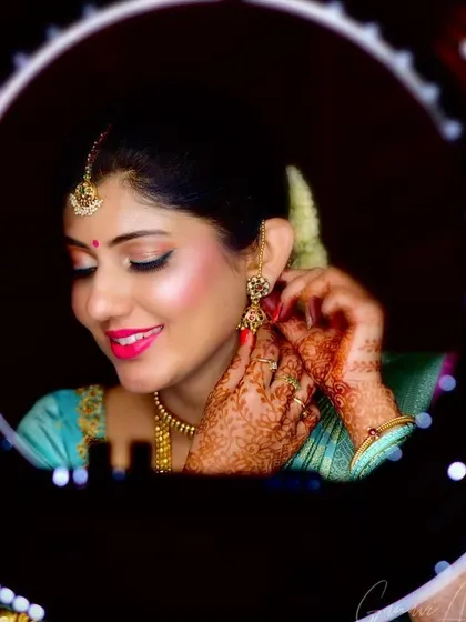A fun, behind-the-scenes shot using a ring light to check the final look. I always make sure every detail is perfect before the bride steps out.