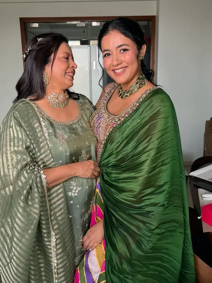 Another adorable shot of the mother-daughter duo. Both are glowing and happy.