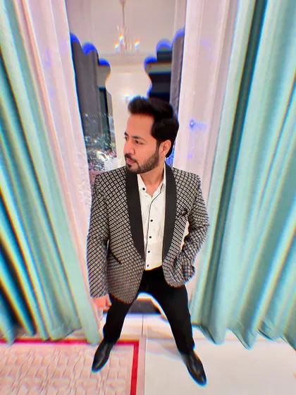 Looking off-camera with a confident expression, ready to make an entrance.
