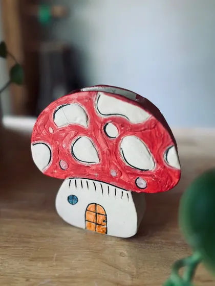 How cute is this mushroom house? This whimsical piece was made in one of our hand-building classes and is a favorite around the studio.