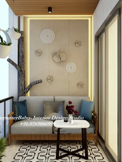 This seating nook on the same balcony provides a more intimate space for conversation. I used a simple wooden sofa with plush cushions and a small coffee table, set against a wall with subtle 3D art, to create a cozy corner.