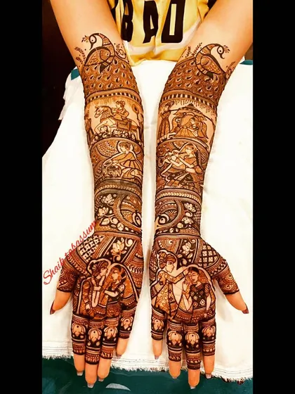 This epic bridal mehendi tells the story of the Ramayana, with scenes of Ram and Sita, alongside the couple's own portrait. It's a powerful blend of mythology and personal love story.