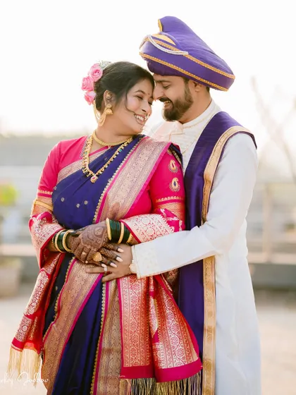 A joyful and candid portrait of the couple on their wedding day.