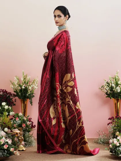 A side view that captures the beautiful flow of the printed saree, a perfect blend of modern femininity and timeless style.