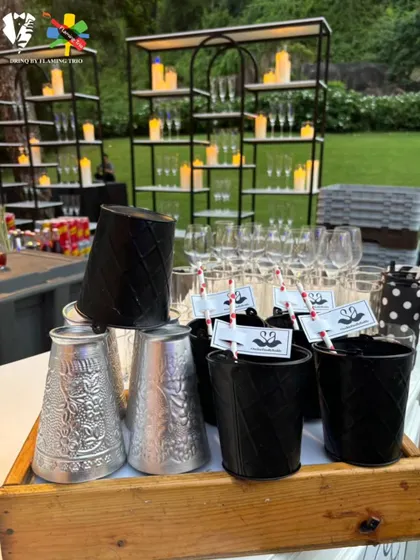 A closer look at the details of our black and white themed bar. We use unique vessels and custom-branded elements to create a cohesive and stylish look.