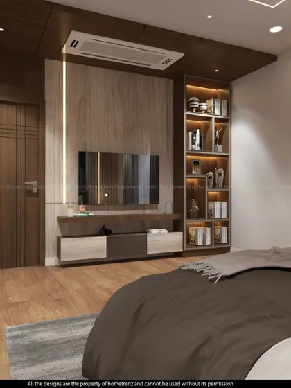 This bedroom features a TV unit with an integrated, back-lit bookshelf, providing both storage and a beautiful display feature.