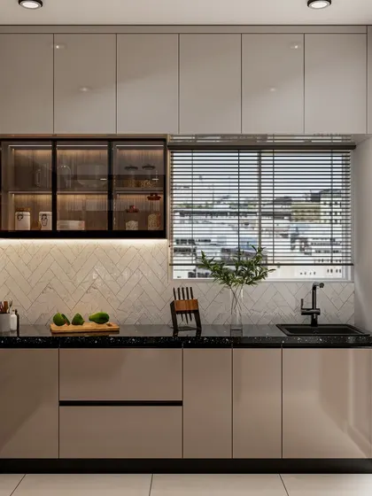 A well-lit kitchen featuring glass-front cabinets and a large window with blinds, creating a bright and airy space for cooking and prep.
