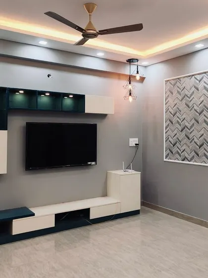 A duplicate of image 270, highlighting the modern aesthetic of the two-tone TV unit and decorative wall panels.