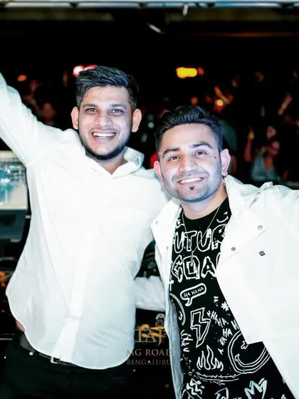 A great moment with a friend and colleague during a packed New Year's Eve event. The energy behind the decks was just as high as it was on the dance floor.