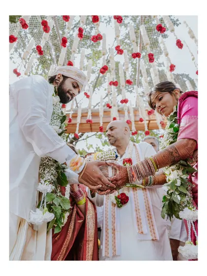 A close-up of the 'kanyadaan' ritual, where the parents of the bride give her away, a moment rich with symbolism.