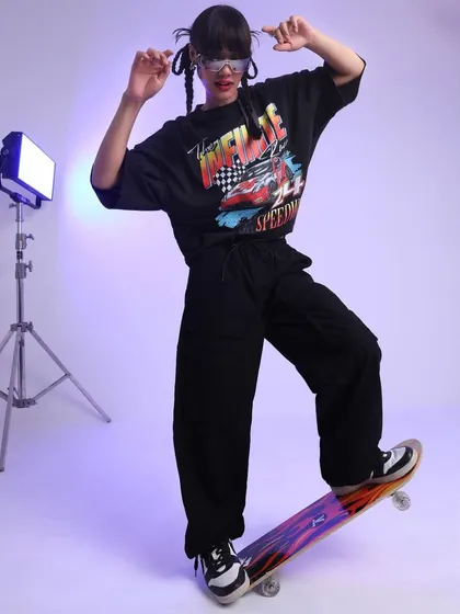 Bringing skater culture into a K-pop aesthetic for Tokyo Talkies. I used an oversized graphic tee, baggy cargo pants, and a skateboard prop to build a complete, authentic character.