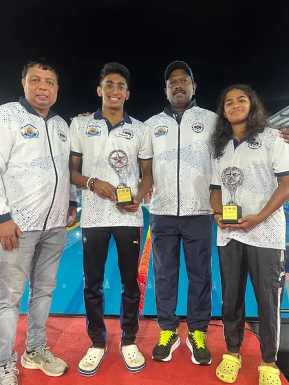 Our champions with their proud coaches.
