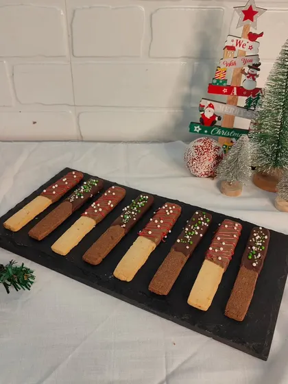 Another shot of my vanilla and chocolate finger cookies, set against a festive Christmas backdrop. They are as fun to look at as they are to eat.