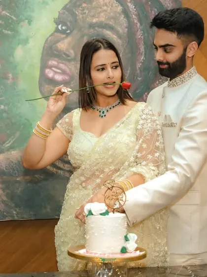 A playful and romantic moment during an engagement celebration. These are the memories that will always make you smile.