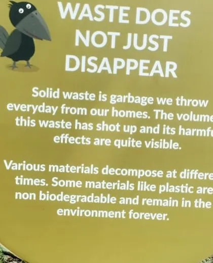 A waste-learning sign at SwachaGraha Kalika Kendra, where we visited Vasuki to learn about composting and what happens to waste.