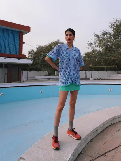 A full-length look from the Rasti India shoot, styled by an empty pool for a cool, retro vibe. This shows my ability to create a unique mood and setting for a brand's collection.