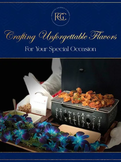 A server presents a tray with a mini tabletop grill serving freshly grilled paneer tikka. This interactive serving style keeps the food warm and adds a unique touch to the guest experience.