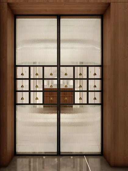 A detailed view of the Puja room doors, designed to bridge traditional aesthetics with the home's modern interior. The design is both respectful and stylish.