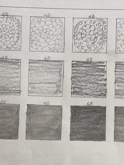 More shading practice, showing how to create gradients and textures using different pencil pressures and techniques.