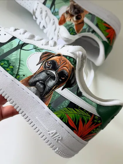 Yes, I can paint your best friend on your shoes! This was one of my most cherished recent projects, creating custom pet portraits on a pair of Nike Air Force 1s. I worked to capture the unique personality of this client's boxer and French bulldog, setting them against a lush jungle background. It’s a beautiful way to keep your furry friends with you on every step.