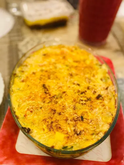 My creamy spinach and corn bake, fresh out of the oven. It's a rich and cheesy dish that's a wonderful warm appetizer for any event.