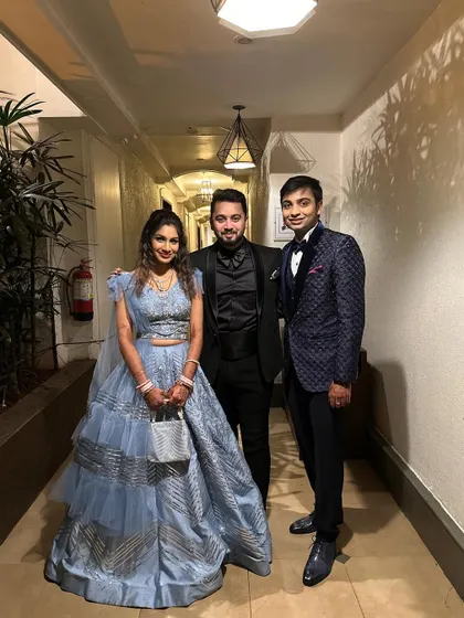 Another picture with the happy couple in the hotel corridor, ready for their reception. They look stunning and ready to party.