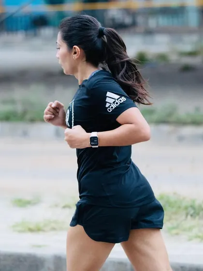 Focused and determined during the TCS10K. This race was a test of resilience, running just days after being on antibiotics, but I was grateful to manage a personal best.