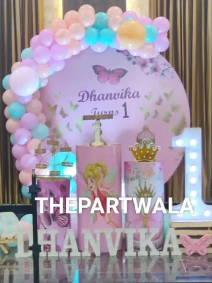 A magical fairy and butterfly theme for a first birthday, with a light-up number '1'.