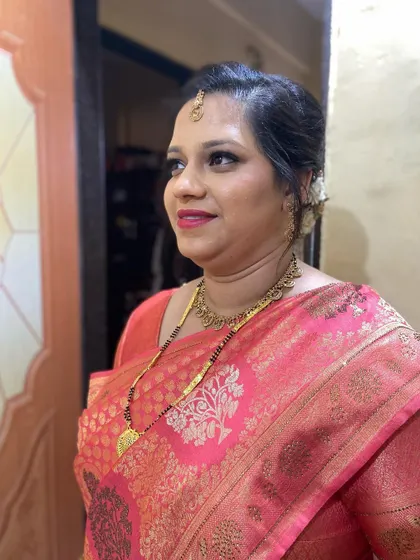 Another beautiful shot of this client. Her makeup is flawless and her hairstyle is elegant and secure.