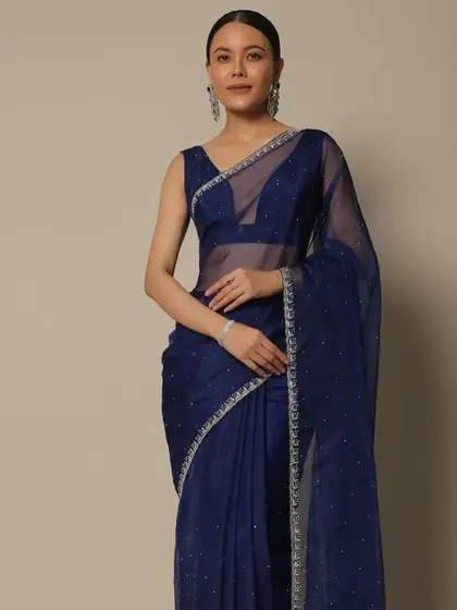 Another angle of the navy blue saree, showing how the simple styling works from all sides. The look is understated yet undeniably chic.