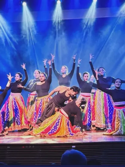 A powerful moment frozen in time from our Manch 2025 folk medley performance. This image captures the culmination of two months of dedicated training, teamwork, and passion that my students bring to the stage.