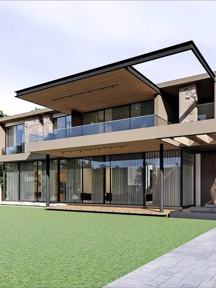 Another view of the Jammu residence, highlighting the expansive ground-floor glazing and the large covered terrace on the upper level. The design provides ample space for family life while maintaining a sophisticated architectural presence.