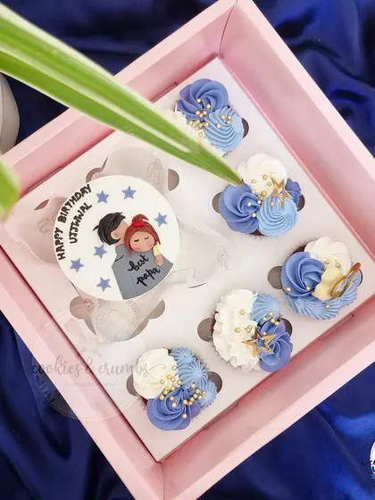 My bento and cupcake combos are a bestseller. This set features a custom "Best Papa" bento cake paired with six matching blue and white cupcakes.