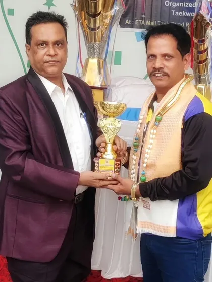 Receiving an award for my contribution as a coach. The success of my students is my greatest reward.