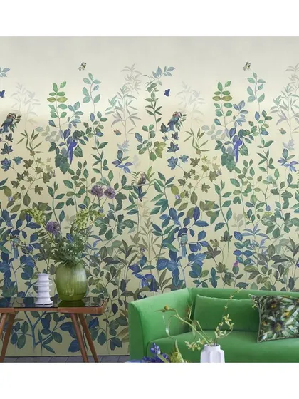 Create your very own indoor garden by incorporating the Voiliere wallpaper, which depicts a beautiful scene of foliage, grass, and butterflies. The climbing botanical pattern adds a sense of height and natural elegance to the room.