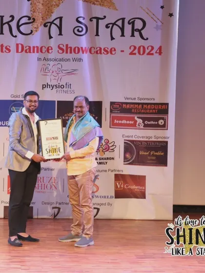 Presenting an award at the "It's Time to Shine" Student Dance Showcase 2024.