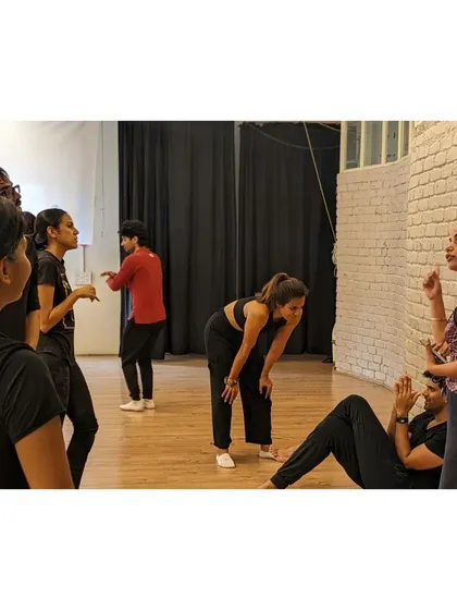 The morning energy in our X-Sense class is contagious and drives us through the day. Here, students discuss a piece of choreography.