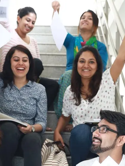 The joy of completing a course level. A group of our students celebrating their progress and the bonds they've formed along the way.
