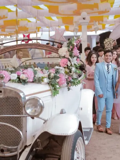 A vintage car for a classic exit. We love capturing unique details like this that add a special touch to a wedding day.