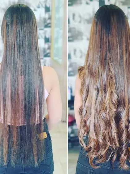 The back view of this incredible color and curl transformation. The length and volume are just as impressive as the custom color work.