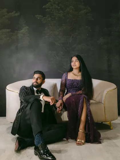 A fine-art portrait capturing a couple's distinct yet complementary energies. She brings the lightness, he brings the calm, and together they create a perfect, harmonious balance against a moody, enchanting backdrop.