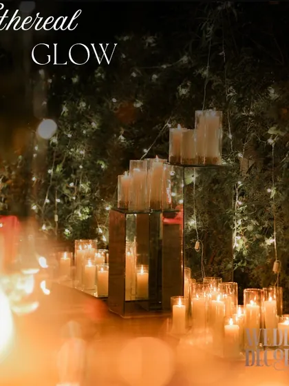 The 'Ethereal Glow' created by clusters of candles on mirrored surfaces. This technique is one of my favorites for creating a powerful sense of magic and romance.