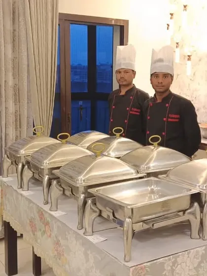 Our team providing catering services in a residential apartment, showcasing a compact and efficient setup.
