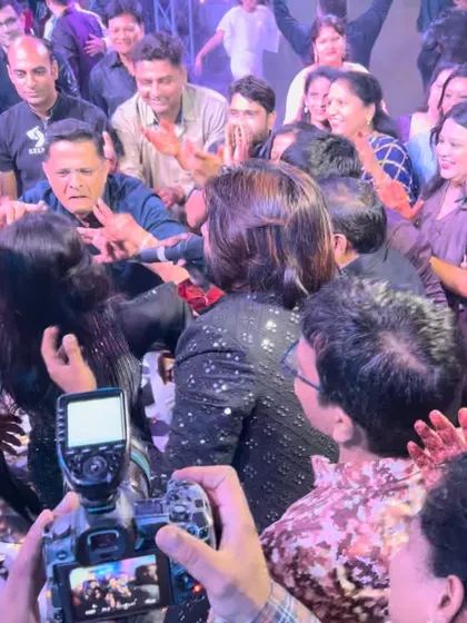 Surrounded by guests who are singing and clapping along. This is what audience interaction looks like at my events, creating a shared, immersive experience.