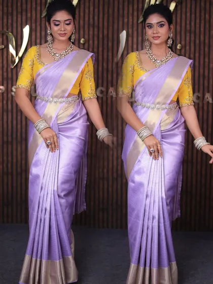 Model Kannama in a beautiful lavender silk saree. The contrasting yellow blouse makes the look pop, and the drape is kept sleek and modern.