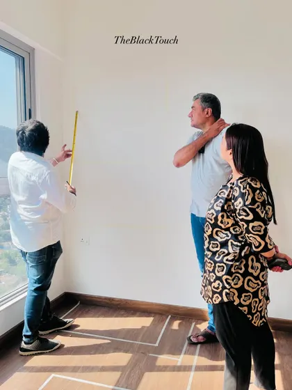 Discussing design details with the client on-site. We believe in a collaborative process, involving our clients in decisions to ensure their vision is realized.